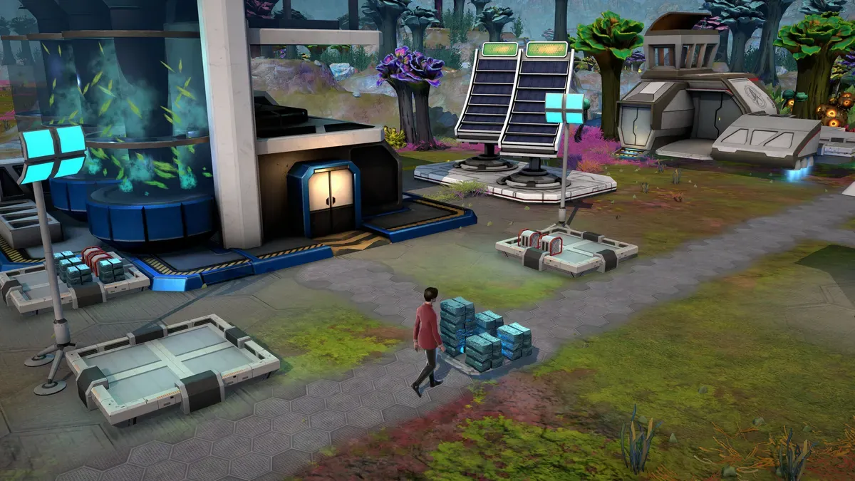 Research facility building with solar arrays and a crew member walking past in Star Trek: Outposts Unknown